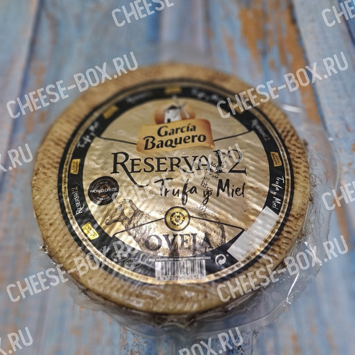 Полутвёрдый Сыр Manchego Reserva 12 Oveja, Trufa y Miel (Манчего 12 месяцев из овечьего молока с трюфелем и мёдом).